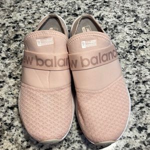 New Balance pink slip ons